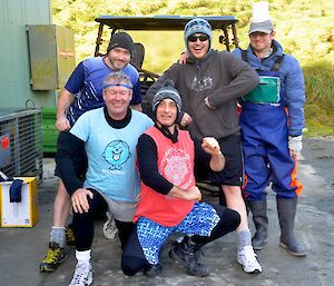 The five competitors just before the start. Standing: Craig, Aaron and Tom (wearing fisherman overalls and a small bucket on his head). Kneeling: Dave wearing a blue ‘Mr Perfect’ T-shirt and Tony wearing a beanie and colourful bike shorts