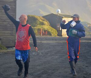 Tony and Tom saluting the crowd as they finish the race