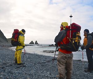 Aaron, Marty and Tony standing on the beach just south of Nuggets Point. The Nuggets rock stacks are in the background