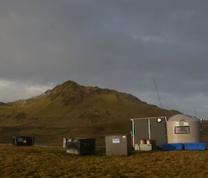 A uniquely modified water tank hut. These structures were specially built for the Macquarie Island Pest Eradication Programme and were flown in place by helicopter. They provide a valuable refuge from the harsh conditions experienced on the island