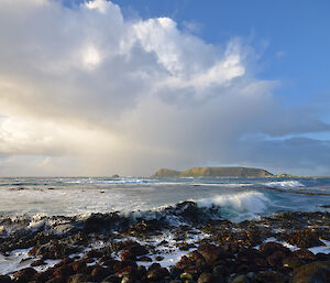 Looking northeast form the rocky coast across Hasselborough Bay towards North Head and developing storm clouds