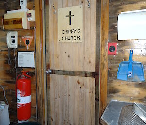 The door to the Hydroponics room with a plark that says Chippys Church