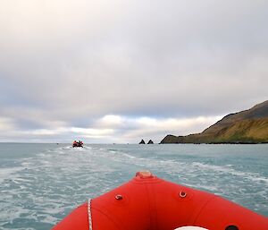 Taken from one of the boats looking south with the other two boats ahead and the rugged coast to the right and the Nuggets ahead on the middle of the horizon