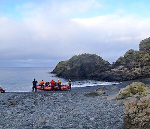 View from near Green Gorge hut looking towards the three IRB’s on the beach and the rocky outcrops surrounding the small bay