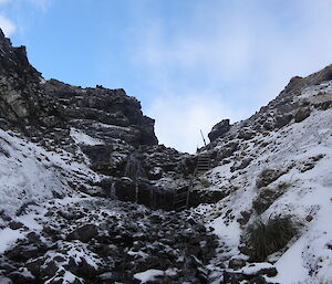 Looking up gadgets creek there are some ladders secured down that we have to climb