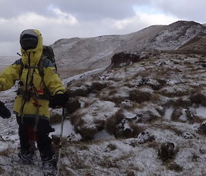 Patty and Marty wearing their snow gear standing on the feather bed