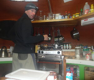 Marty wearing his head torch at the kitchen cooking