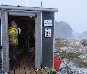 Leona at Davis Point hut preparing to go out to work in the snow