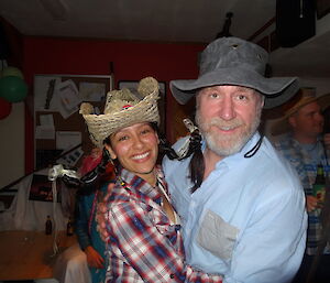 Patty and nick dressed up as outback folk wearing their cowboy hats