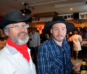 Clive and Craig dressed up as outback boys wearing cowboy hats and cowboy shirts