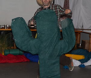 Steve dressed up as an outback Cactus and isdancing on the dance floor