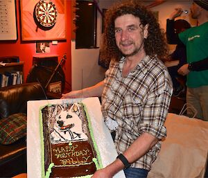 Billy with his birthday cake made and decorated by Chef Tony and Patty