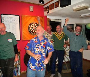 John, Tony, Dave Craig and Clive, cheering after they just won the Antarctic Darts final