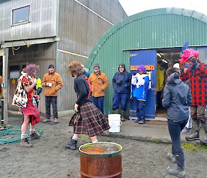 The two kilt clad boys (Dean and Billie) geeing up the expectant participants of the haggis hurling competition