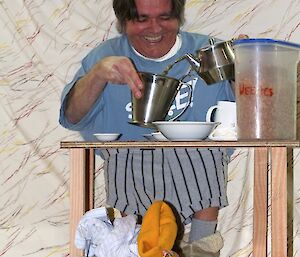 Breakfast — Bernard pours tea straight into the milk jug