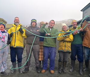 The Champs — The Aussie team photo — from the left: Chris, Greg, Aaron, Tom, Josh, Karen, Craig, Dave and Nancye, holding the rope