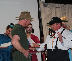 An appearance by ‘Ranger Spot’ (aka Ranger Chris) on the scene — telling Russel about his long list of credentials. The evil stepmother and the two ugly sisters are in the background