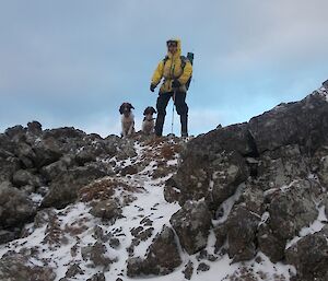 On top of the world — Billy with Colin and Joker standing on a rocky, snow covered ridge