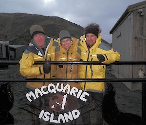 Nick, Angela and Billy — the MIPEP artists who revamped the gate. They are standing behind the gate, with the artwork of the central panel in front of them