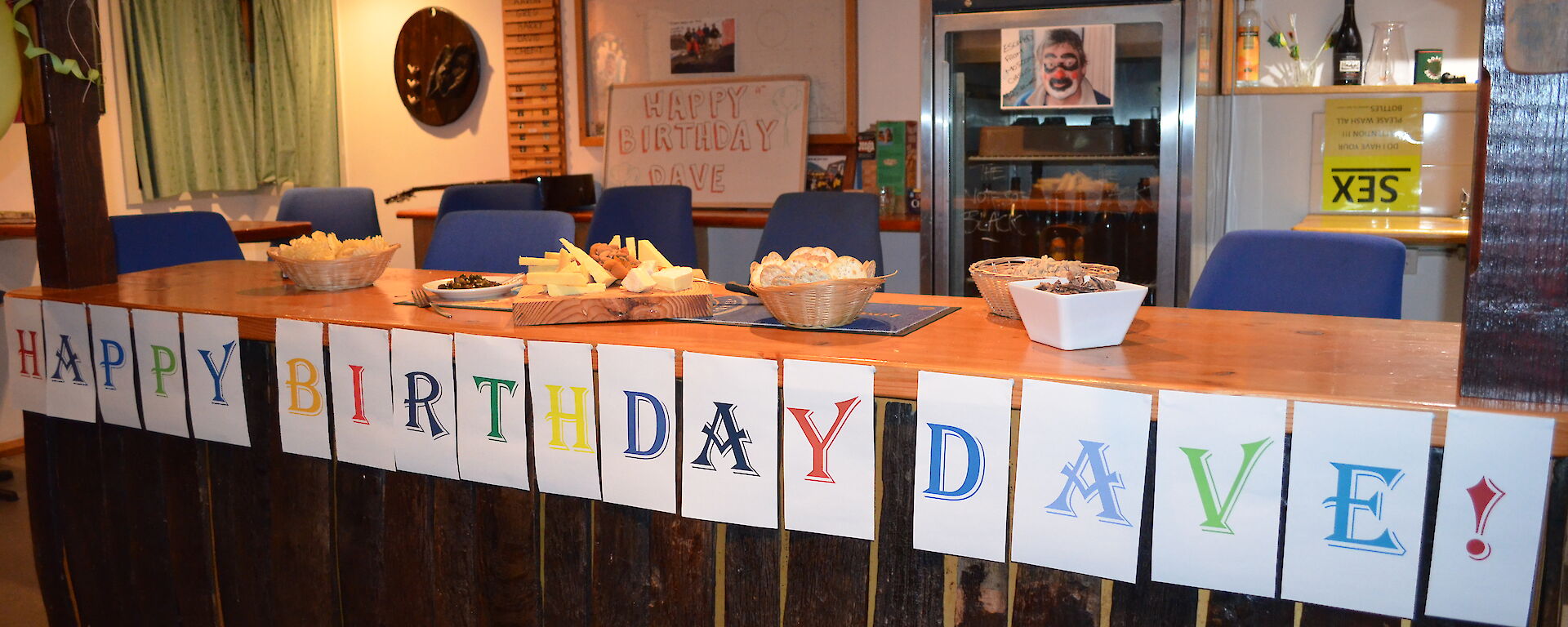 Celebrating Dave’s birthday — The Macca bar area adorned with decorations with a frieze of letters across the front edge of the bar spelling ‘Happy Birthday Dave!'