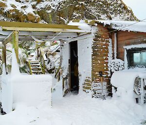 Green Gorge chalet covered in heavy, deep snow