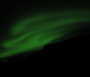 The beautiful green tinged waves of a aurora australis from Green Gorge beach