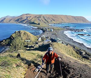 View to the south from the Wireless Hill track. Aaron is foreground, negotiating the steep track. Behind him you can see the station and the isthmus and the escarpment up to the plateau in the background