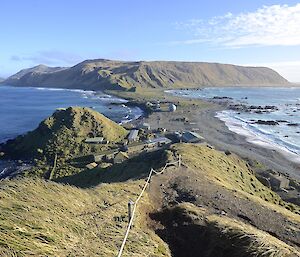 Looking south from the Wireless Hill track on north head on a sunny day. The view is across the isthmus to the distant escarpment and plateau, with Buckles Bay on the left and Hasselborough Bay on the right