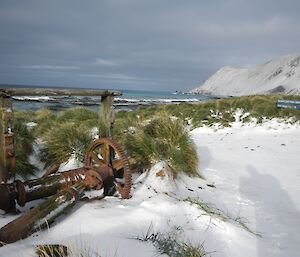 Boat landing winch in July 2013 — colour photo shows the same winch in a snow covered landscape. not much deterioration from the previous image