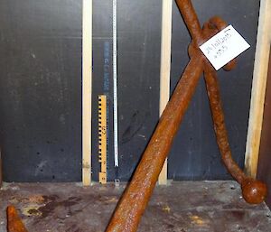 An old, rusted anchor found on the island. Preserved, and ready for storage.