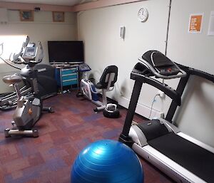 Cardio (exercise) room in the MPB (Multi Purpose Building). You can see a running machine two exercise bikes and a stepping machine, with a fit ball in the foreground