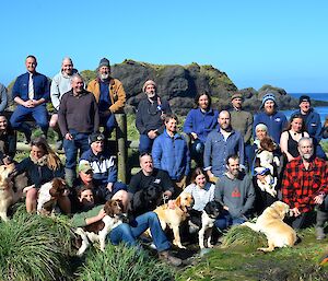 Station photo 2013 — all 25 expeditioners and the MIPEP dogs infront of the seal proof fence at Garden Cove