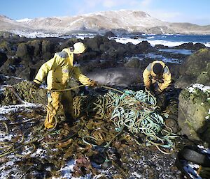 Barry and Chris untangling the huge pile of slime covered rope at the water’s edge. The snow covered hills south of Bauer Bay make a nice backdrop