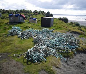 The large pile of rope on the grass beside Bauer Bay hut ready to be stashed into bulker bags