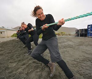 Great effort Ange. The view is of the New Zealand team with Ange the front person showing concentration and effort in pulling the rope