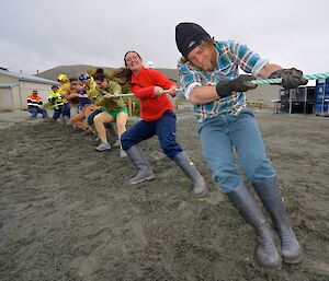 The nine member Aussie team trying hard to win the second round. It shows the effort on their faces. It looks as though they have gained a little ground