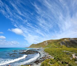 Cirrus invading the sky. The view is down the east coast and eastern escarpment with strands of cirrus cloud appearing to move across the trop of the island