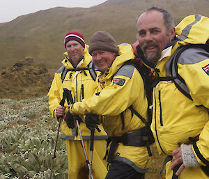 Dave, Dave and Goldie nearly at Green Gorge. They are all dressed in their yellow wet weather gear and each is carrying a back pack