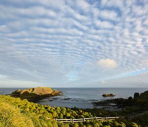 Amazing cloud pattern as viewed to the east from Garden Cove. The wave patterned cloud seems to radiate from a point on the distant horizon