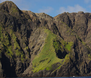 The rugged, steep slopes of the south coast. Some parts of the slope are so steep and rocky that they are devoid of vegetation