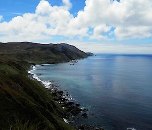 The view to the north along the east coast from the top of Brothers Point. Sandy Bay can be seen about mid-way along the coast and the Nuggets can be seen in the distance