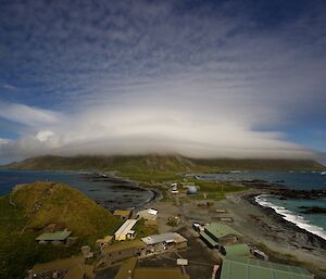 Amazing lenticular cloud cap over the island taken from the golf tee. It shows a multi layer cloud capping the escarpment