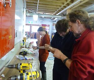 Karen, Mike and Billy making whistles in the workshop