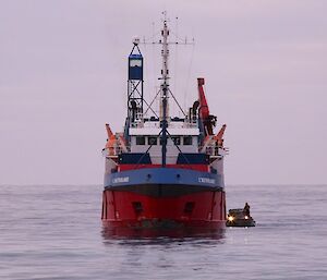 The ship with LARC amphibious truck alongside