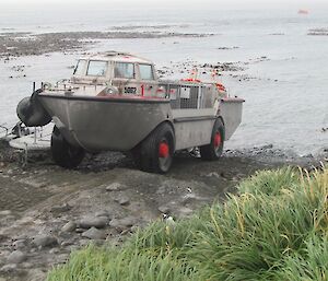 The LARC is seen driving up onto the shore