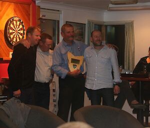 Two rangers present both station leaders with a commemorative plaque