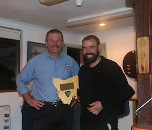 The station leader and previous station doctor with the MIPEP plaque