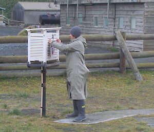 Observer opens a screened box