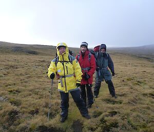 Three expeditioers walking on Macca