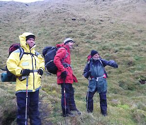 Three expeditioners walking on Macca